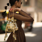 NISHA  POTLI